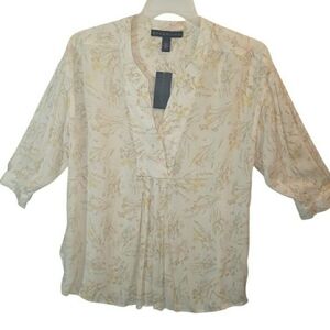 Bandolino womens small blouse is stylish and versatile designed for women.  7025